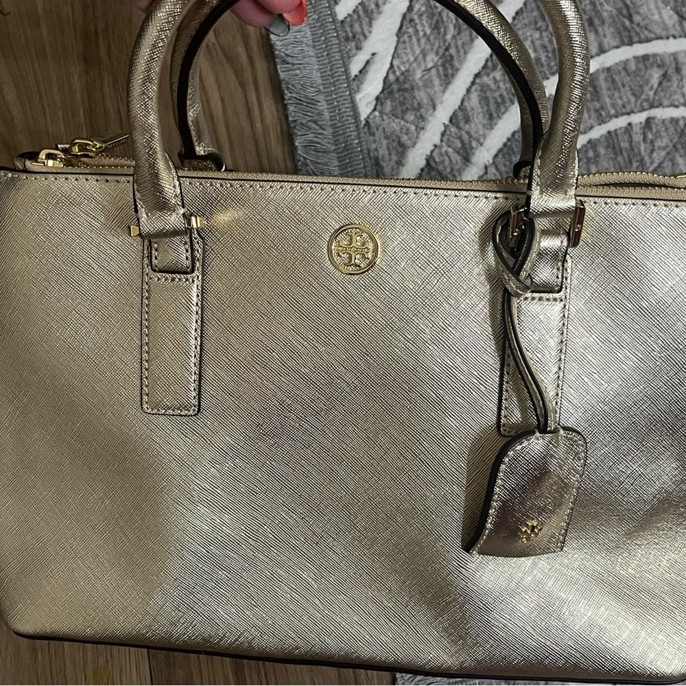 Tory Burch gold coated tote bag with strap enclosed for sale